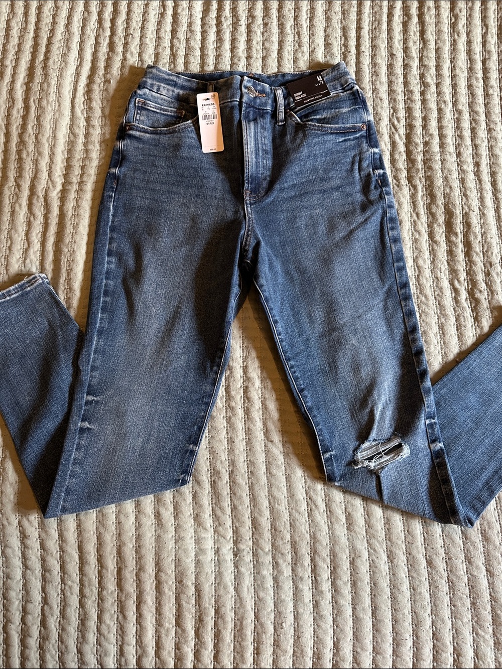 Express Women's Dark Blue Skinny Jeans with Knee Rip